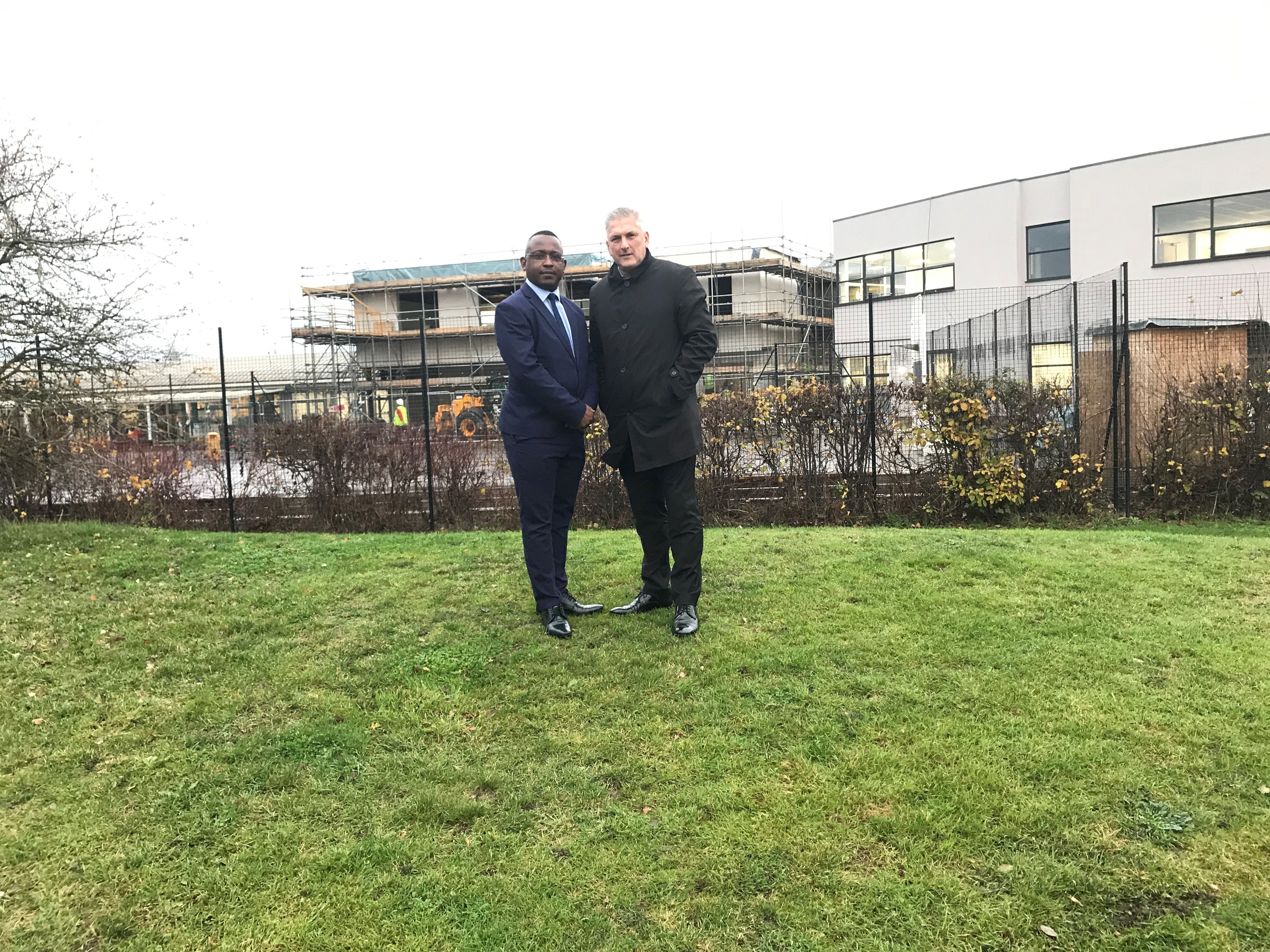 Councillors Mackness and Tejan on the site of the school expansion