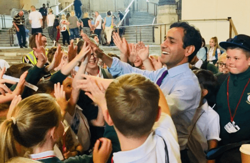 Rehman Chishti high-fives children visiting parliament